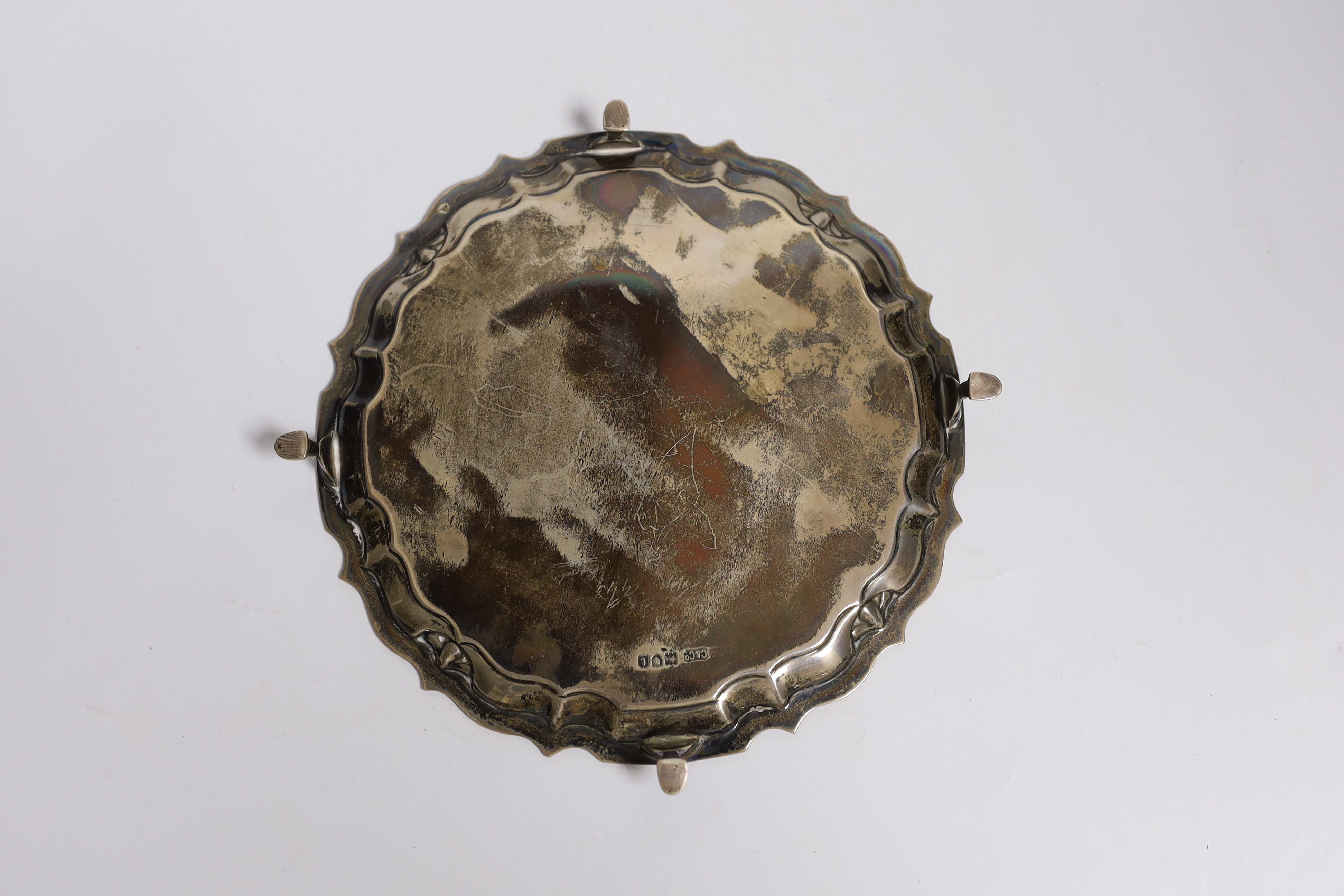 A small George V presentation silver waiter with later central script ‘To John and Ann on their silver wedding Dec 1965 from the DBS’ London, 1919 by Carrington & Co, 20.9cm, 10.7oz.